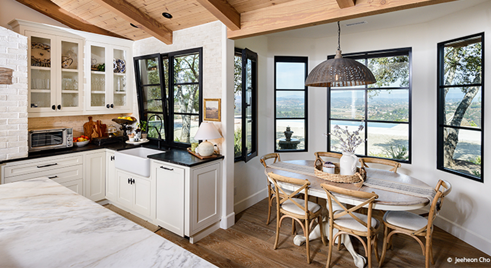 The pricetag of new windows may seem daunting, but they can transform the appearance of your home. Consider updating the color of your window frames or the style of windows in your existing home. These Kolbe replacement windows showcase black windows in a kitchen. 